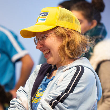 Candace pictured smiling at something off to the left